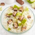 Snickers Salad in a clear bowl