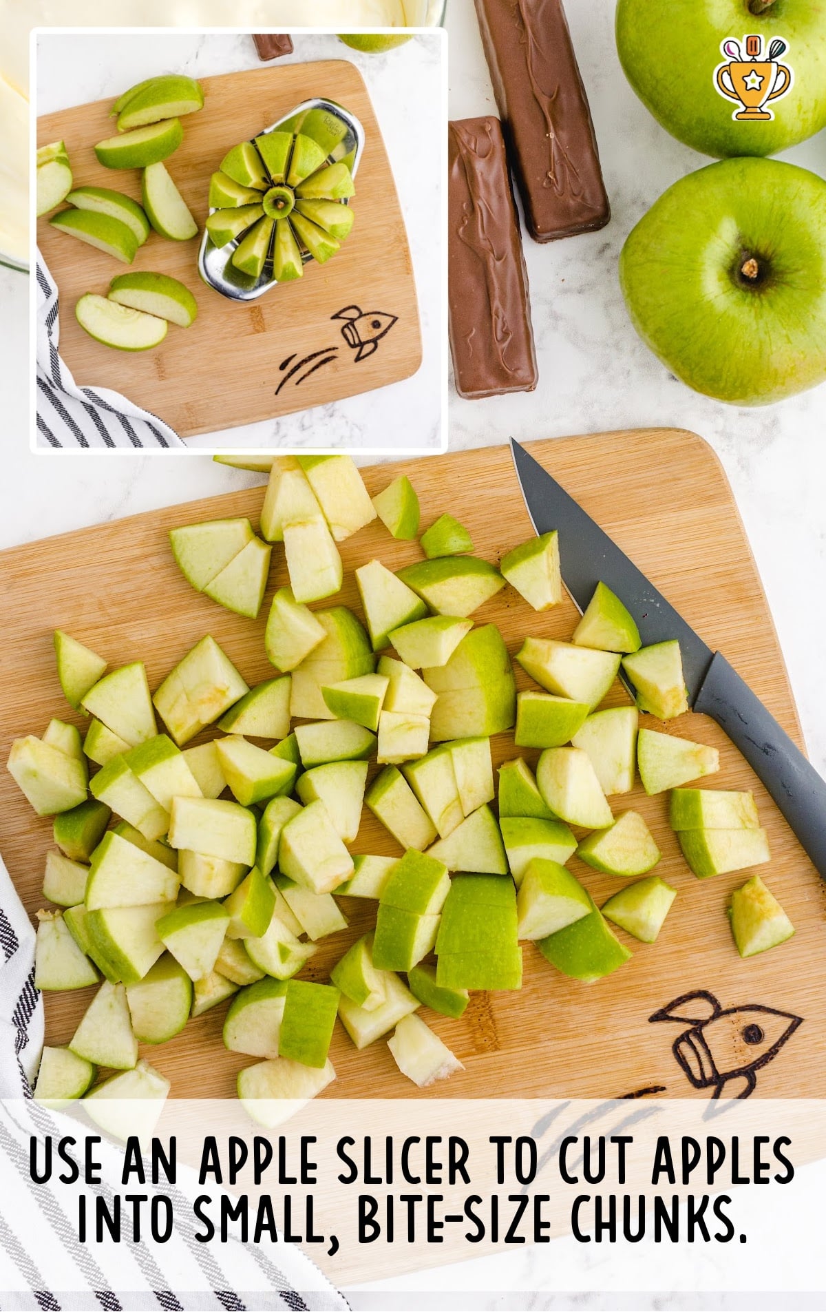 Sliced apples on a wooden board with a knife