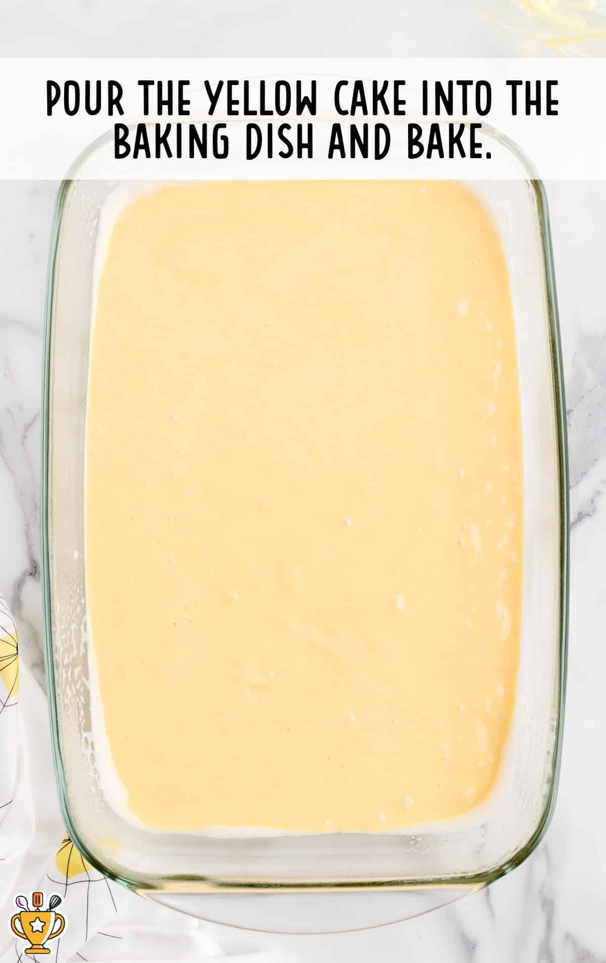 The yellow cake in a baking dish