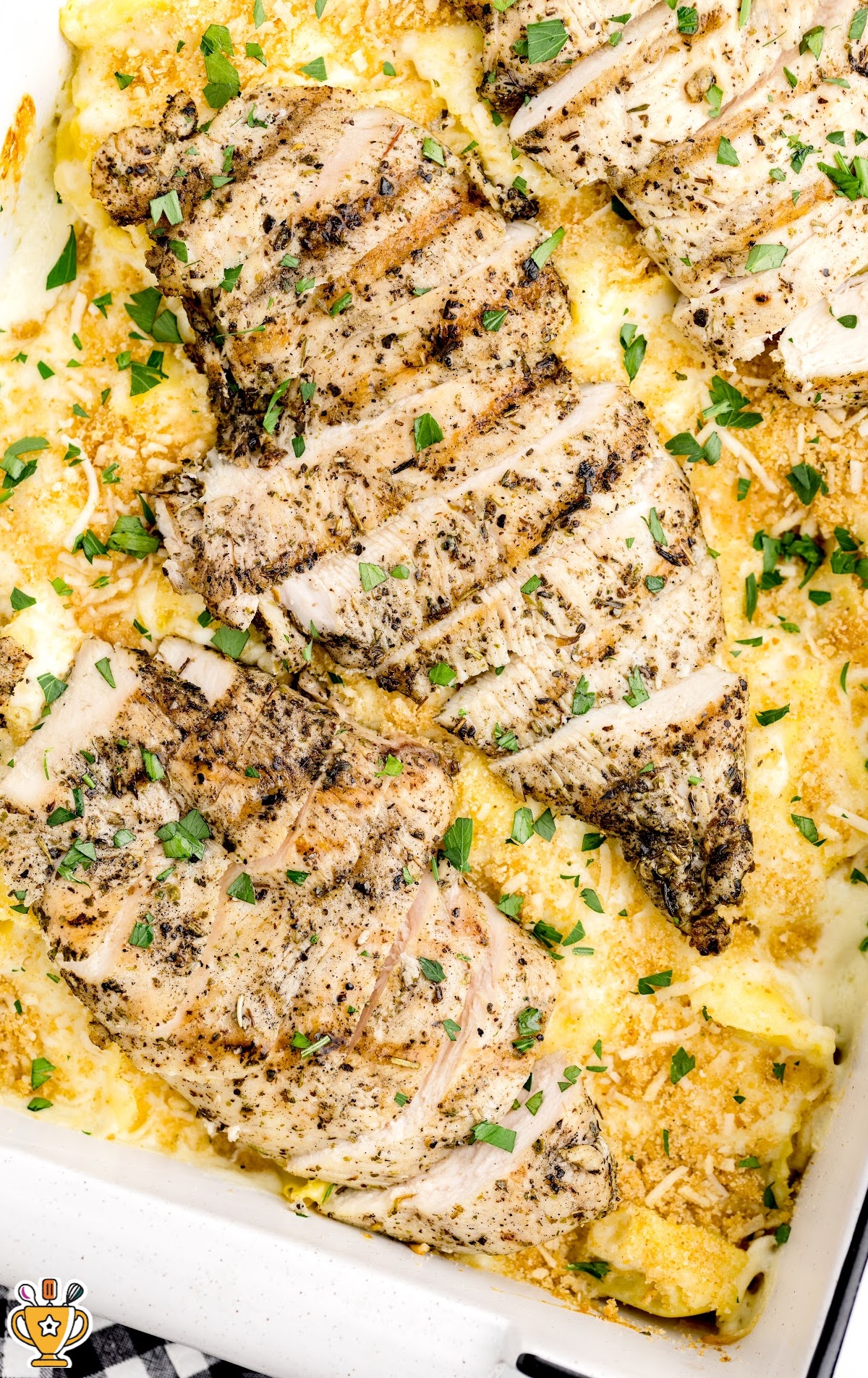 A close up photo of Asiago Tortellini Alfredo with Grilled Chicken