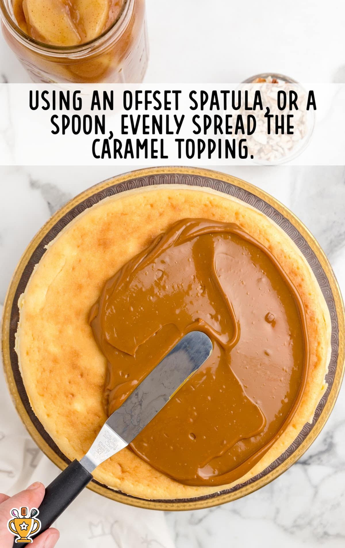 caramel spread over the Cheesecake with a spatula