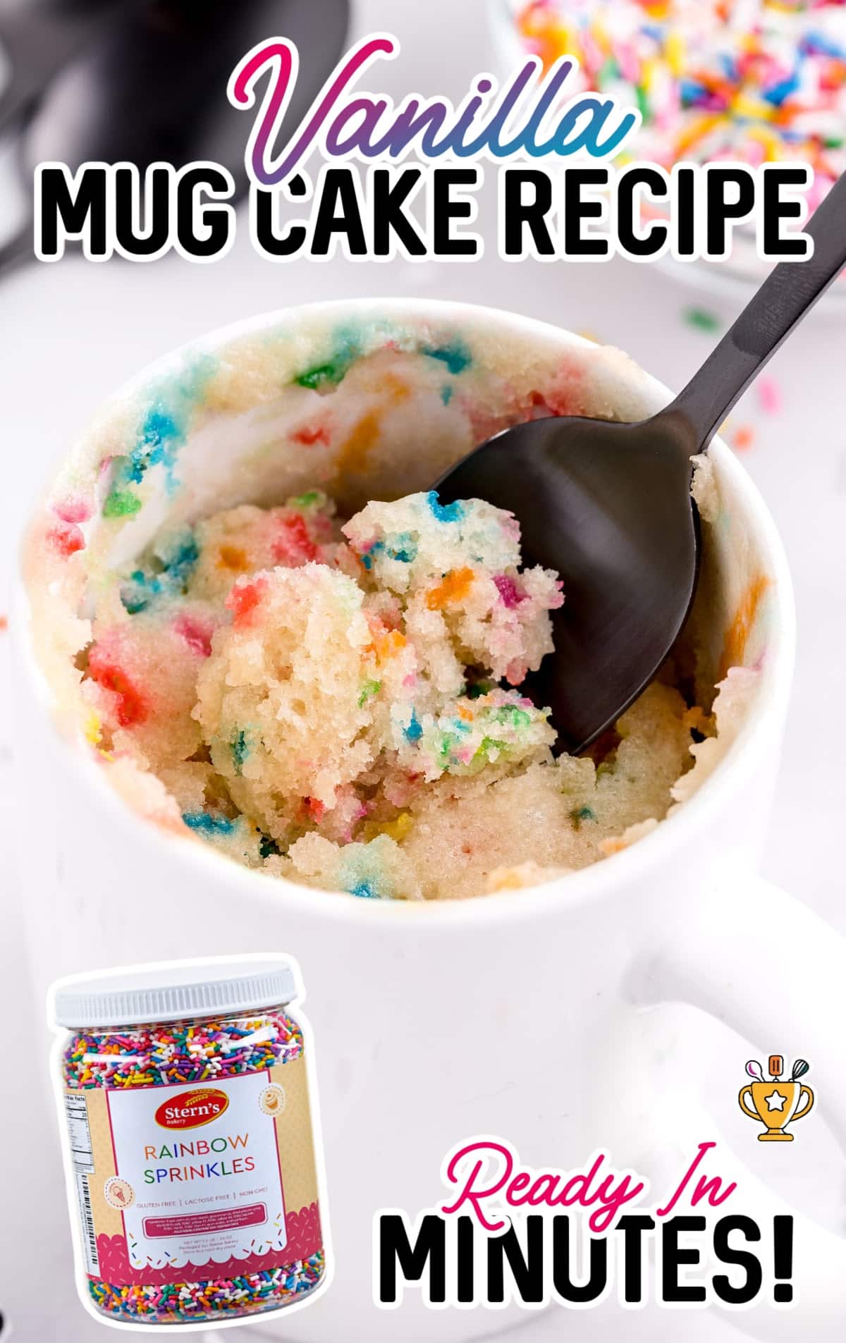 Vanilla Mug Cake Recipe in a mug with a spoon in it