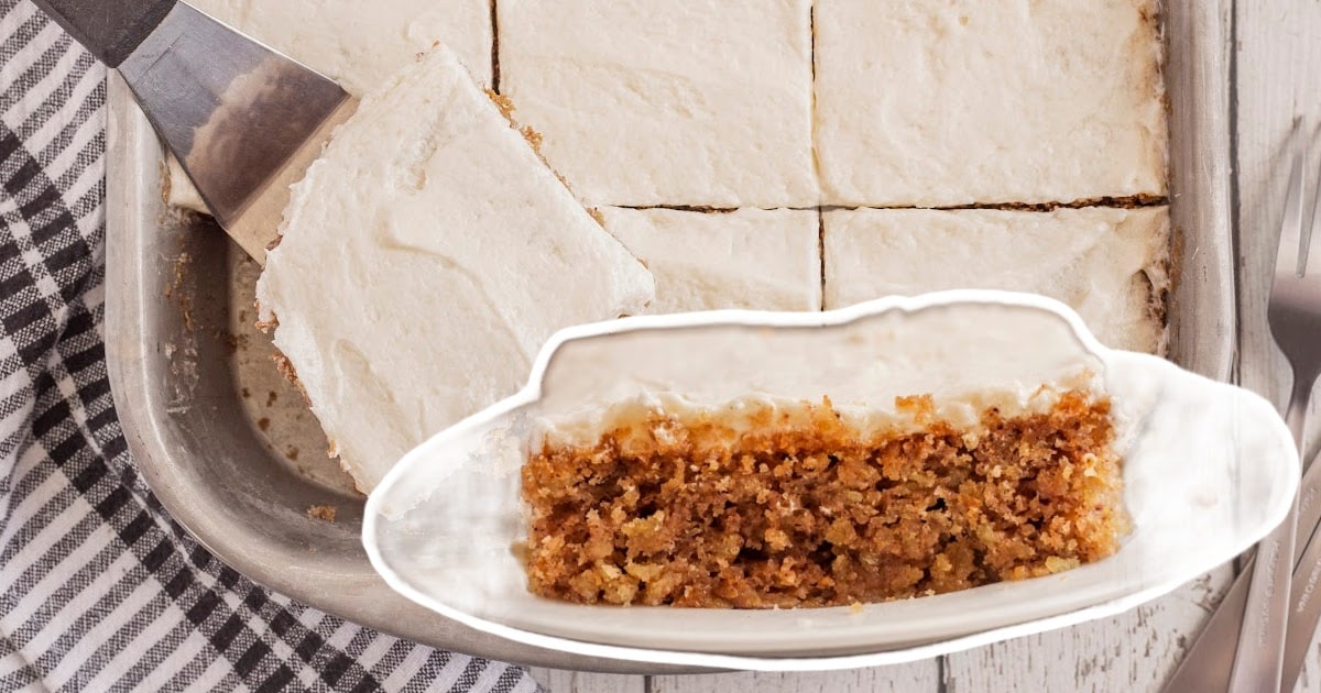 a cake next to a plate with a slice of oatmeal cake on it.
