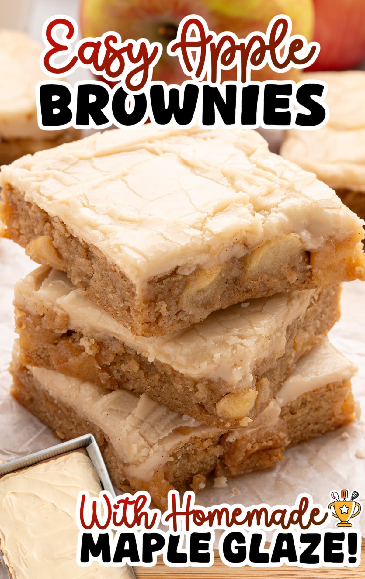 Stack of chewy apple brownies with visible apple chunks and thick maple glaze frosting, shown with text reading Easy Apple Brownies with Homemade Maple Glaze