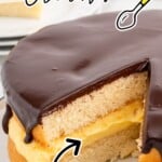 Boston Cream Pie on a plate with a piece missing