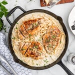 A skillet full of chicken alfredo recipe.