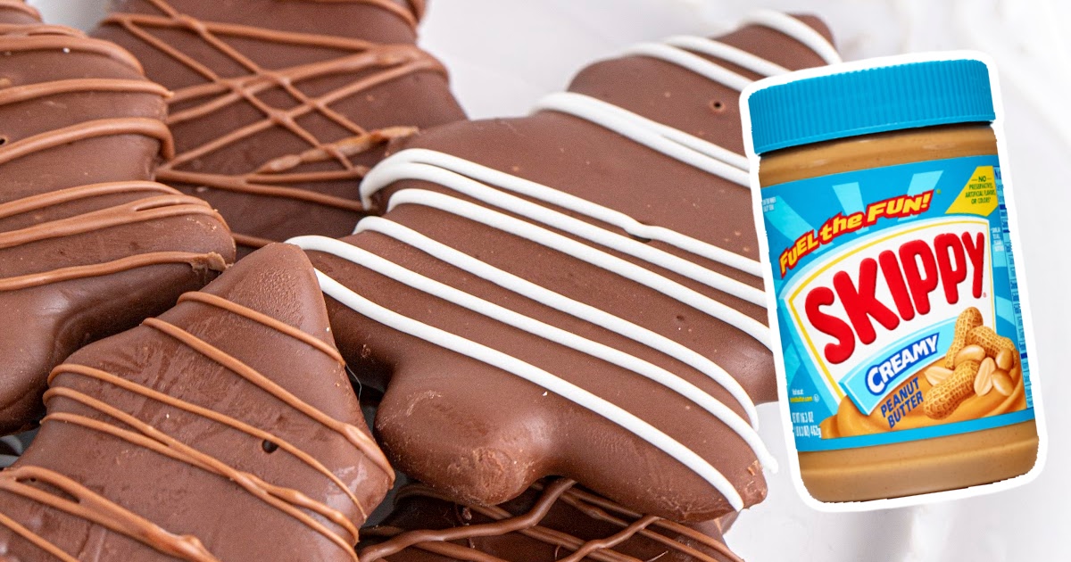 Chocolate Peanut Butter Christmas Trees with a jar of peanut butter on the side