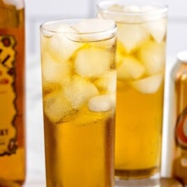 A tall glass of fireball and cream soda.