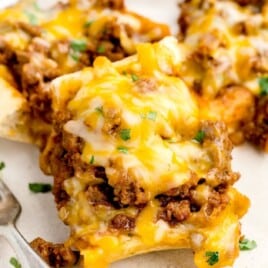 Sloppy Joe Garlic Bread on a plate with a fork