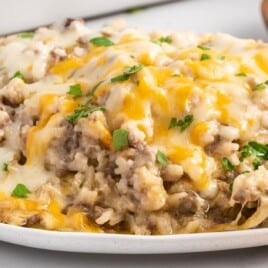 A white plate of Hamburger Rice Casserole