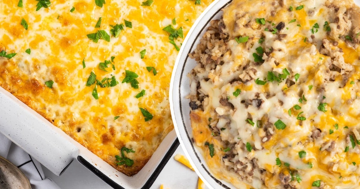 a plate of casserole beside a baking dish covered in bubbly cheese topping.