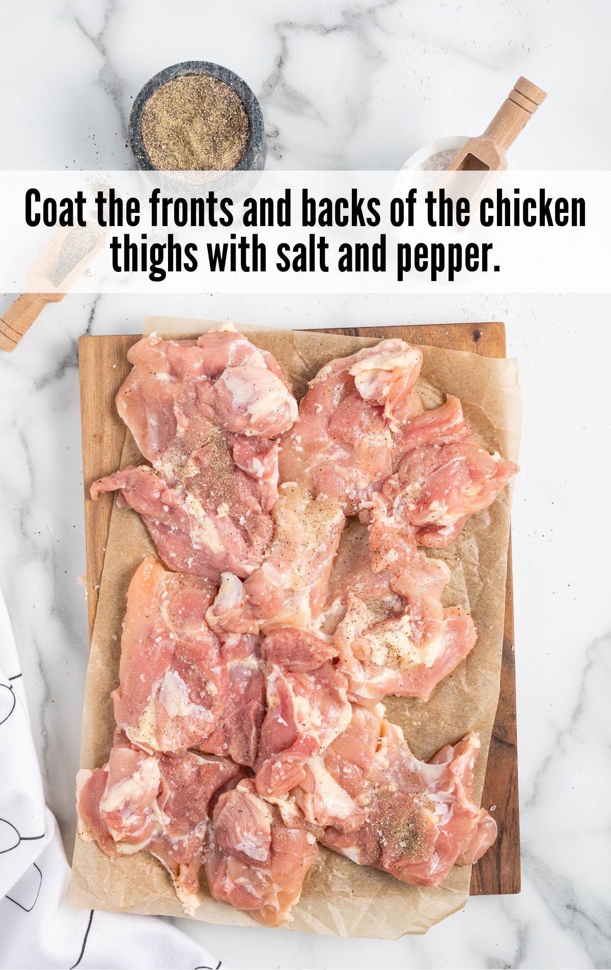 chicken thighs coated with salt and pepper