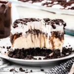 A slice of ice cream dessert on a white plate