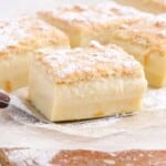 a spatula holding a piece of Magic Custard Cake