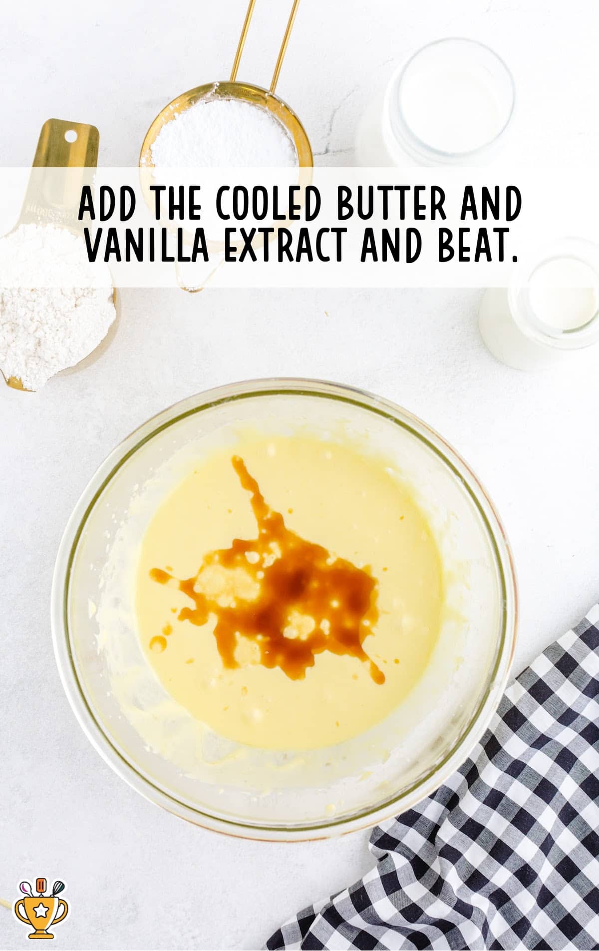 cooled butter and vanilla extract in a bowl