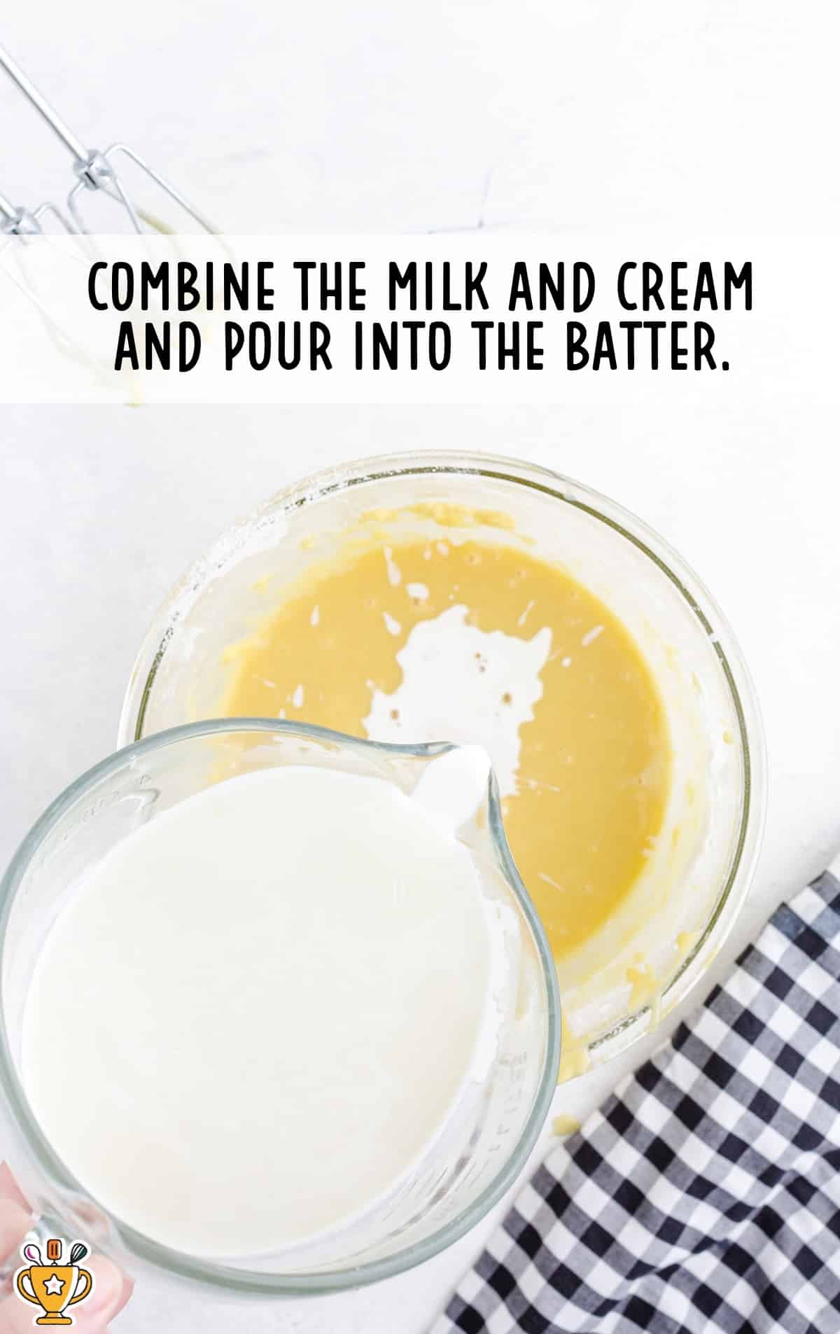 milk and cream combined with batter in a bowl