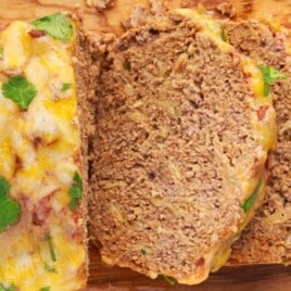 Mexican Meatloaf slices on a wooden board