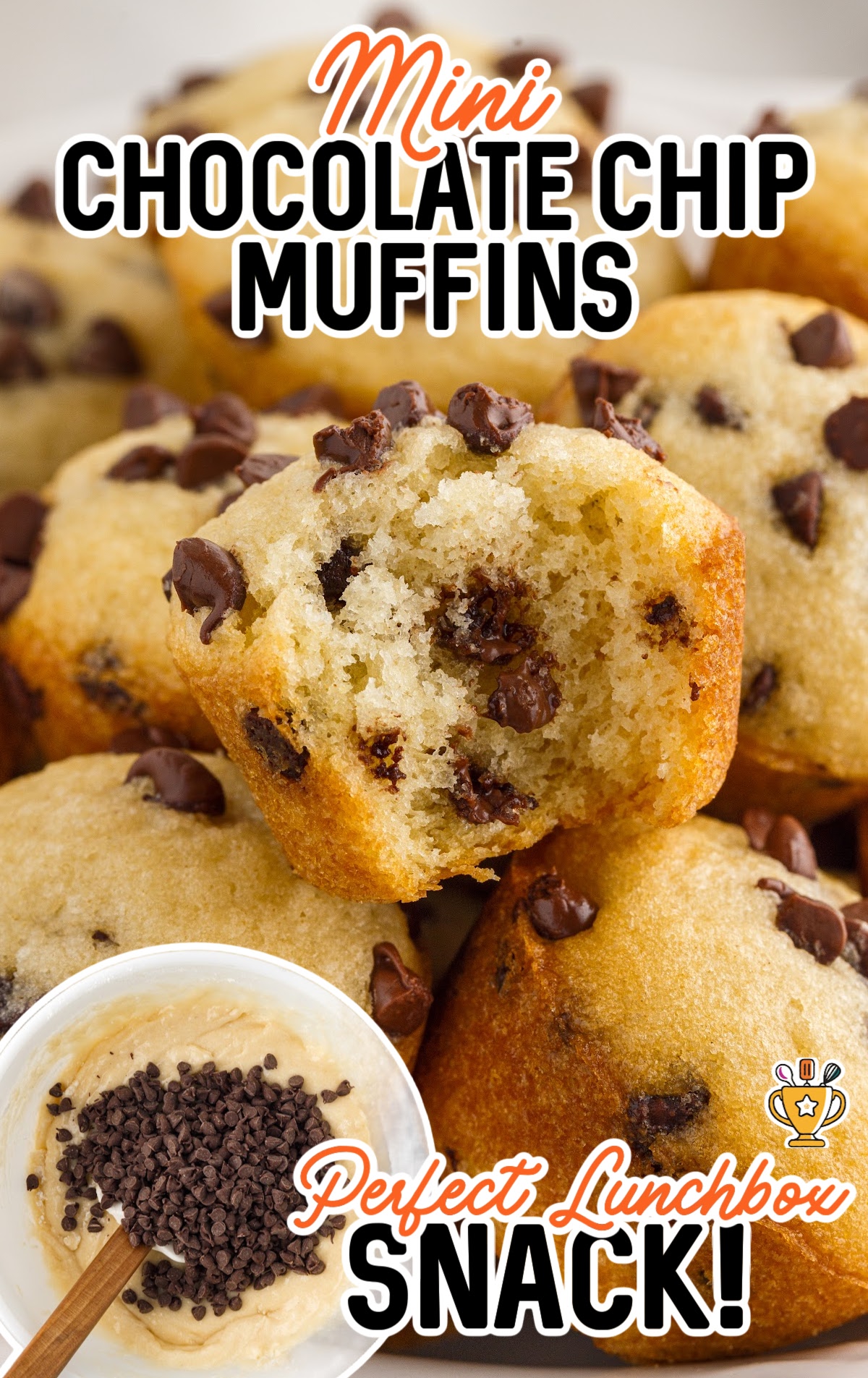 A bunch of Mini Muffins one with a bite on it