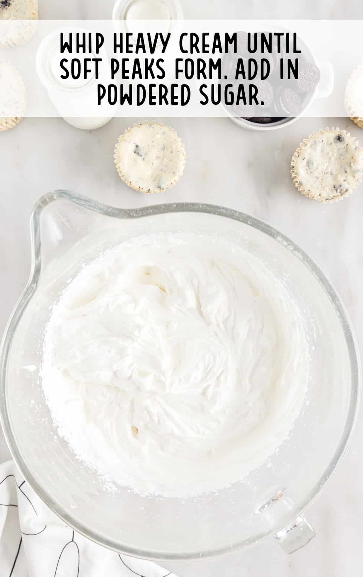 Heavy cream and powdered sugar in a bowl
