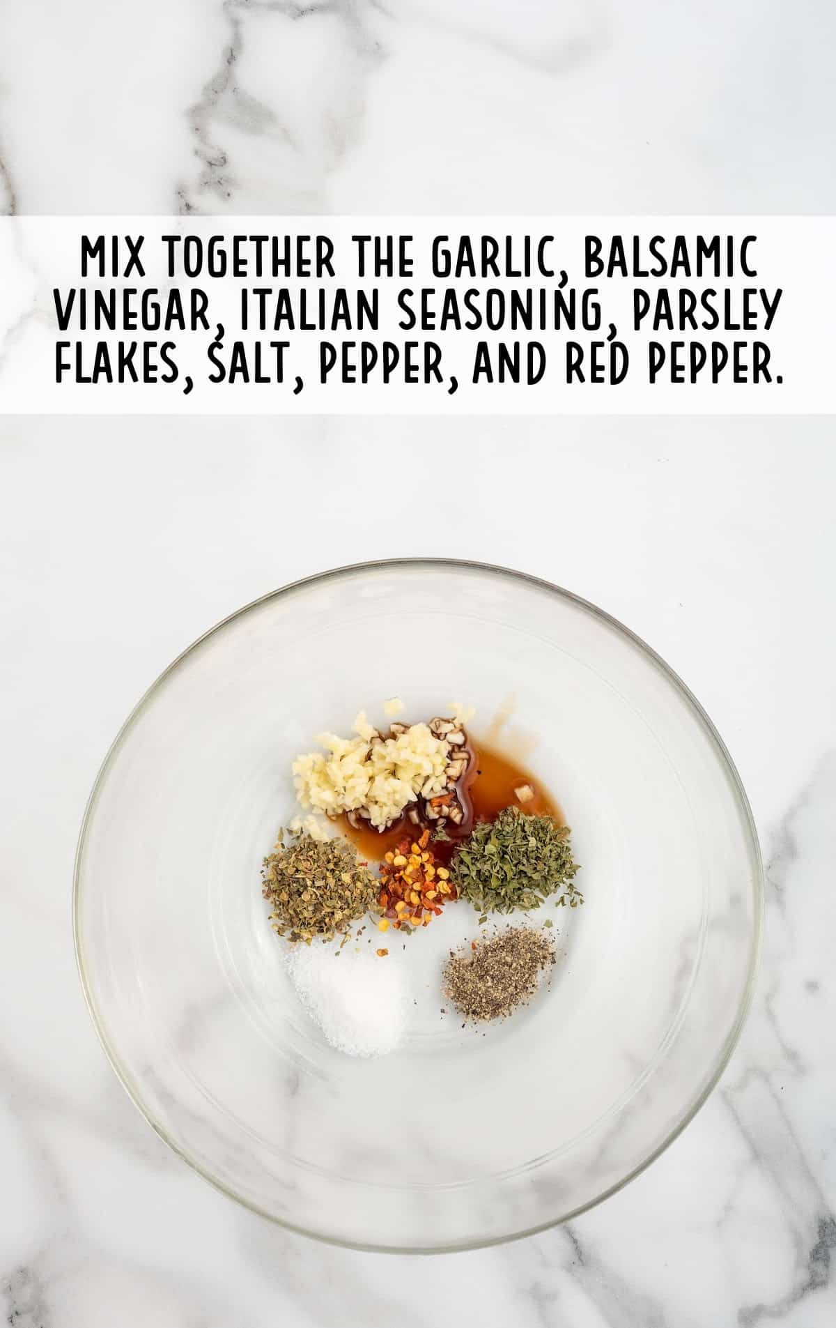 the seasonings are in a glass mixing bowl.