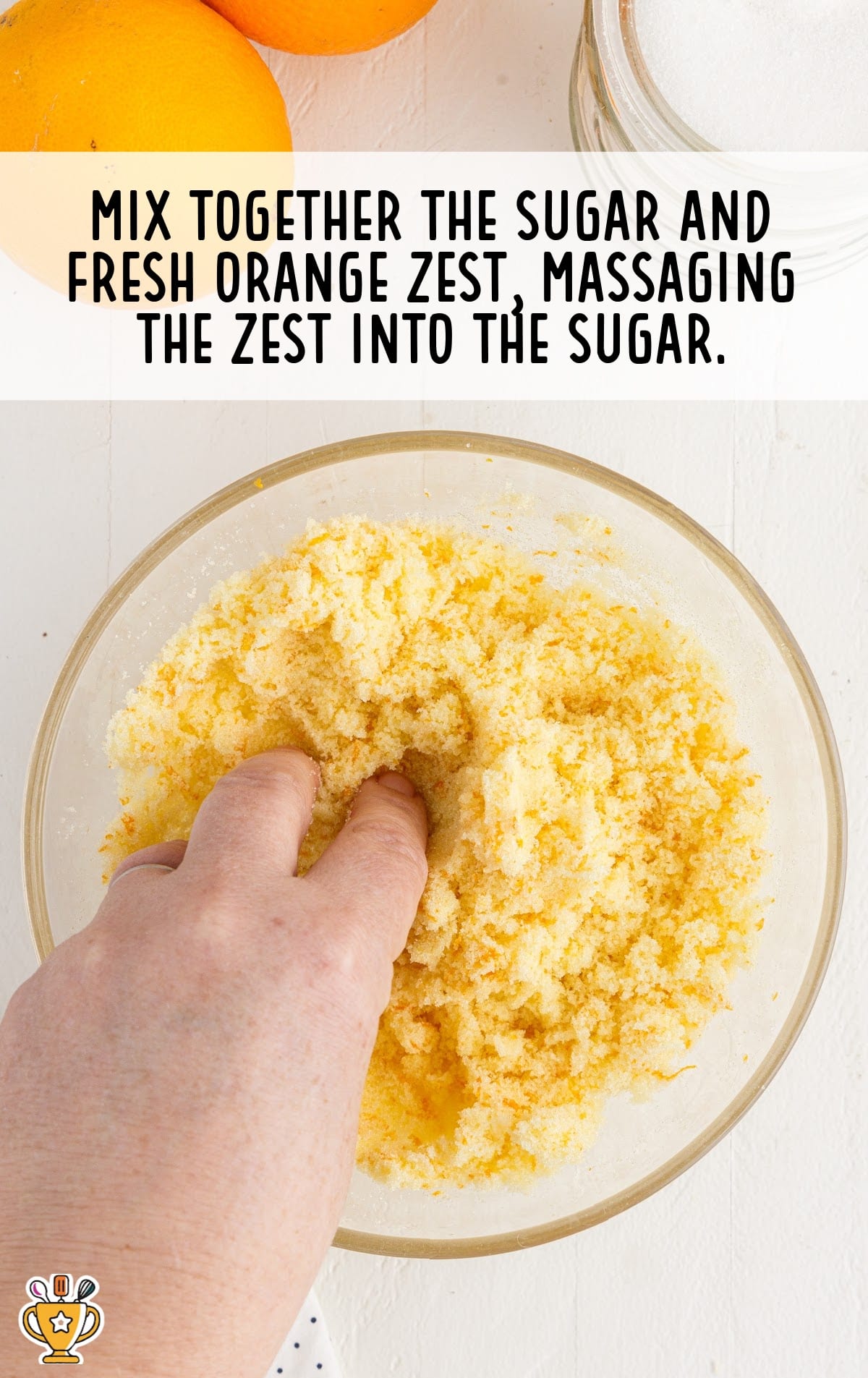 sugar and fresh orange zest mixed in a bowl