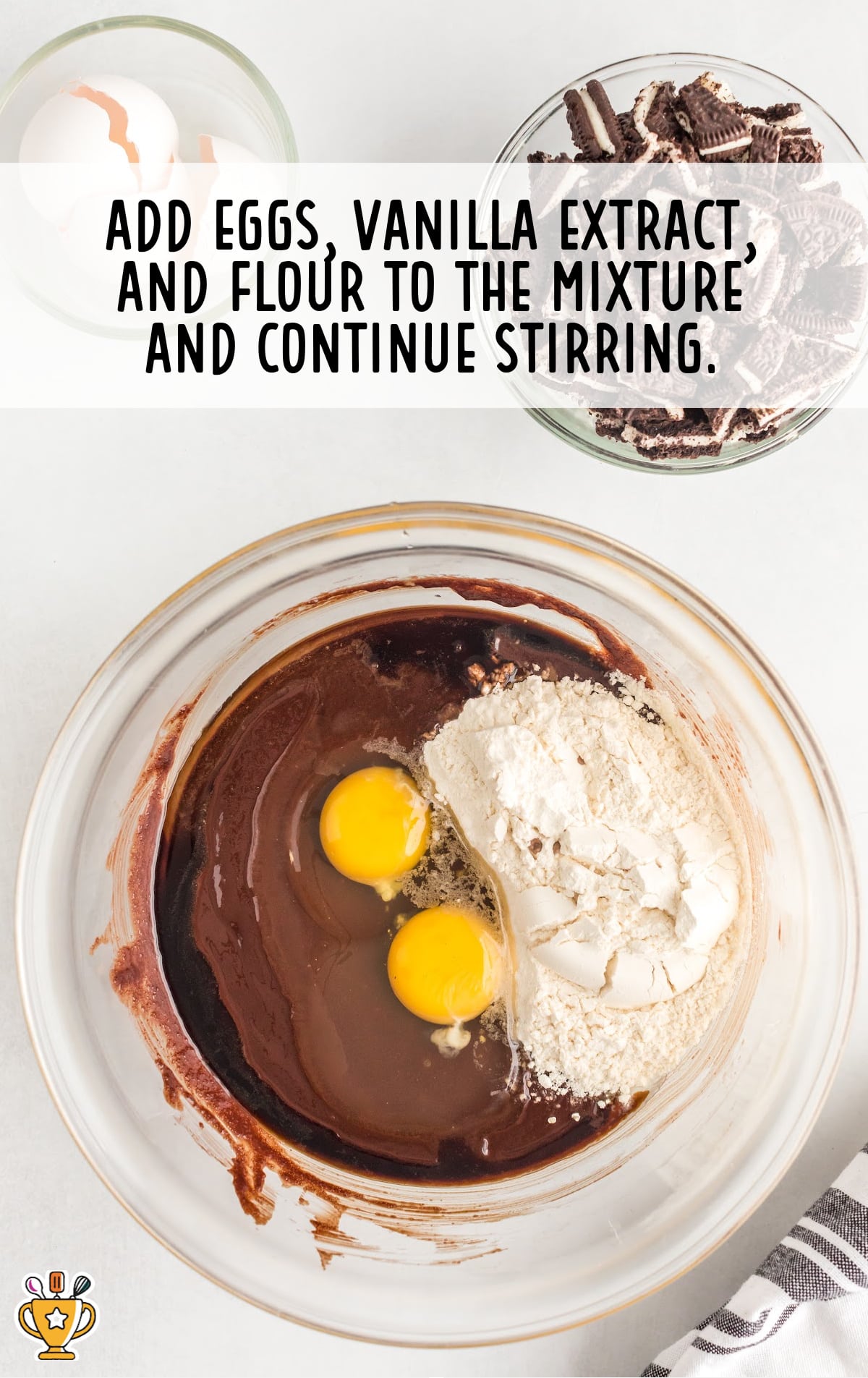 Eggs, vanilla extract, and flour are added to the chocolate mixture.