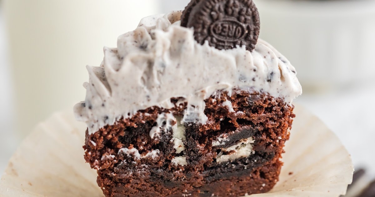 A cupcake with chunks of Oreo in it.