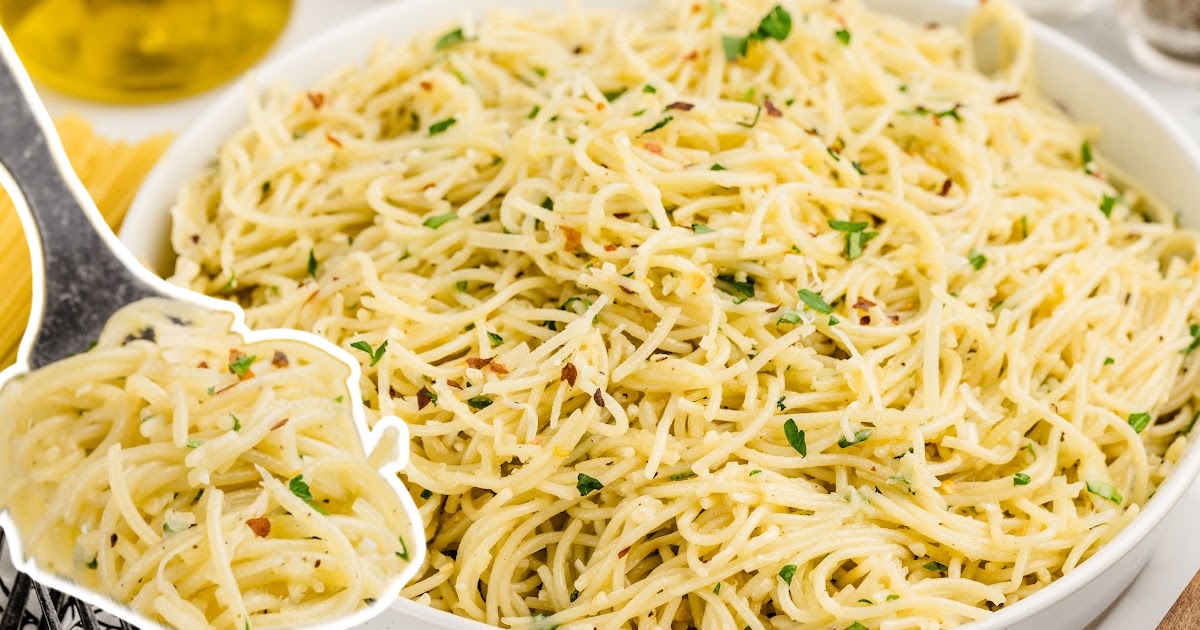 A bowl of noodles and a spoonful of noodles.