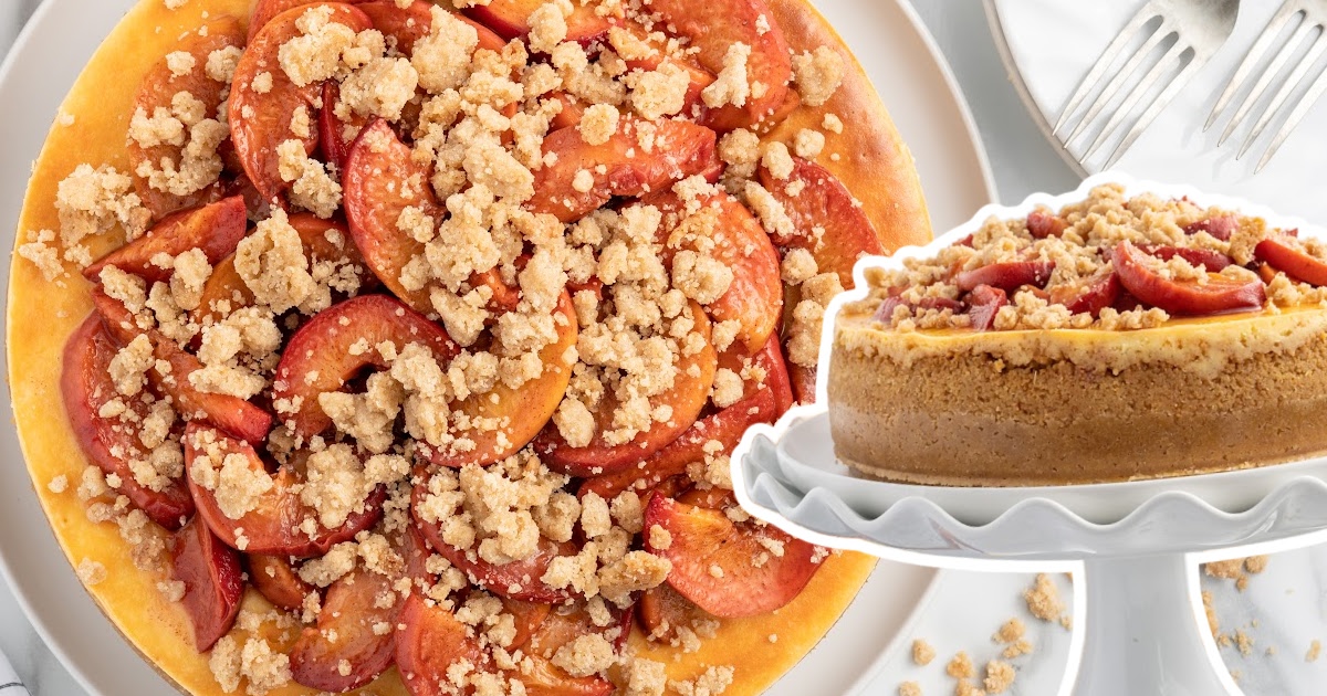 Peach Cobbler Cheesecake on a plate and on a cake stand