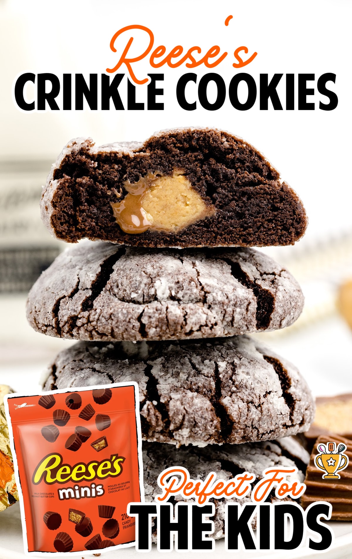 A stack of Reese's Crinkle Cookies and the top one has a bite out of it.