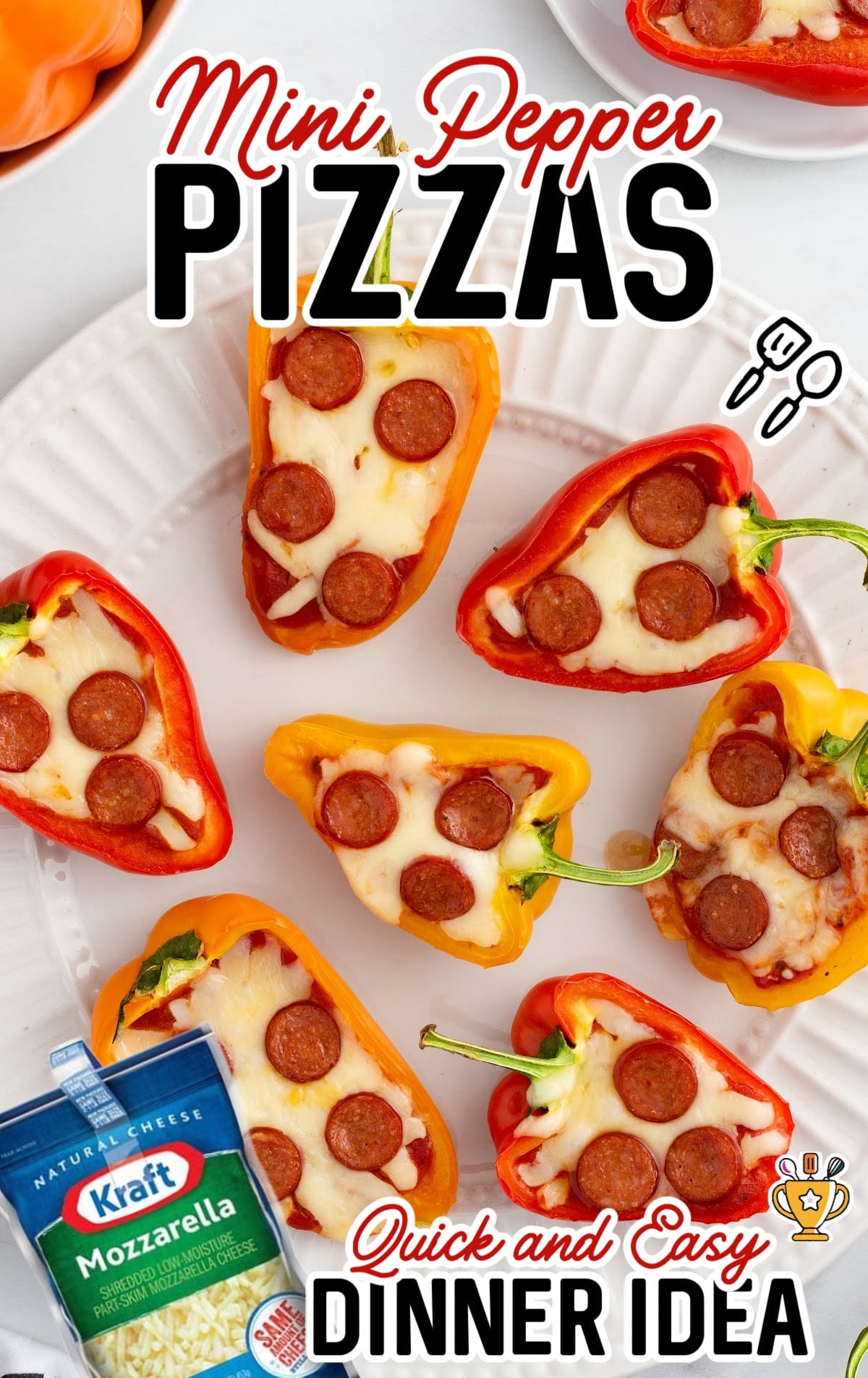 A white dinner plate covered in Mini Pepper Pizzas.
