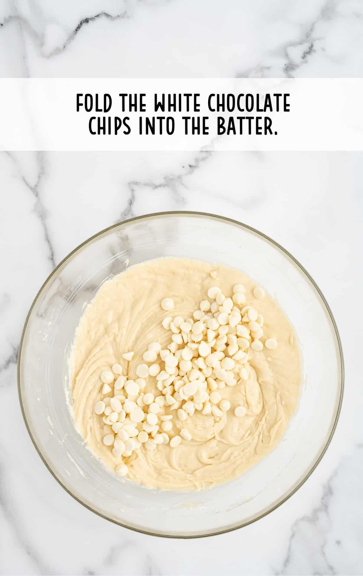 White chocolate chips in a mixing bowl.