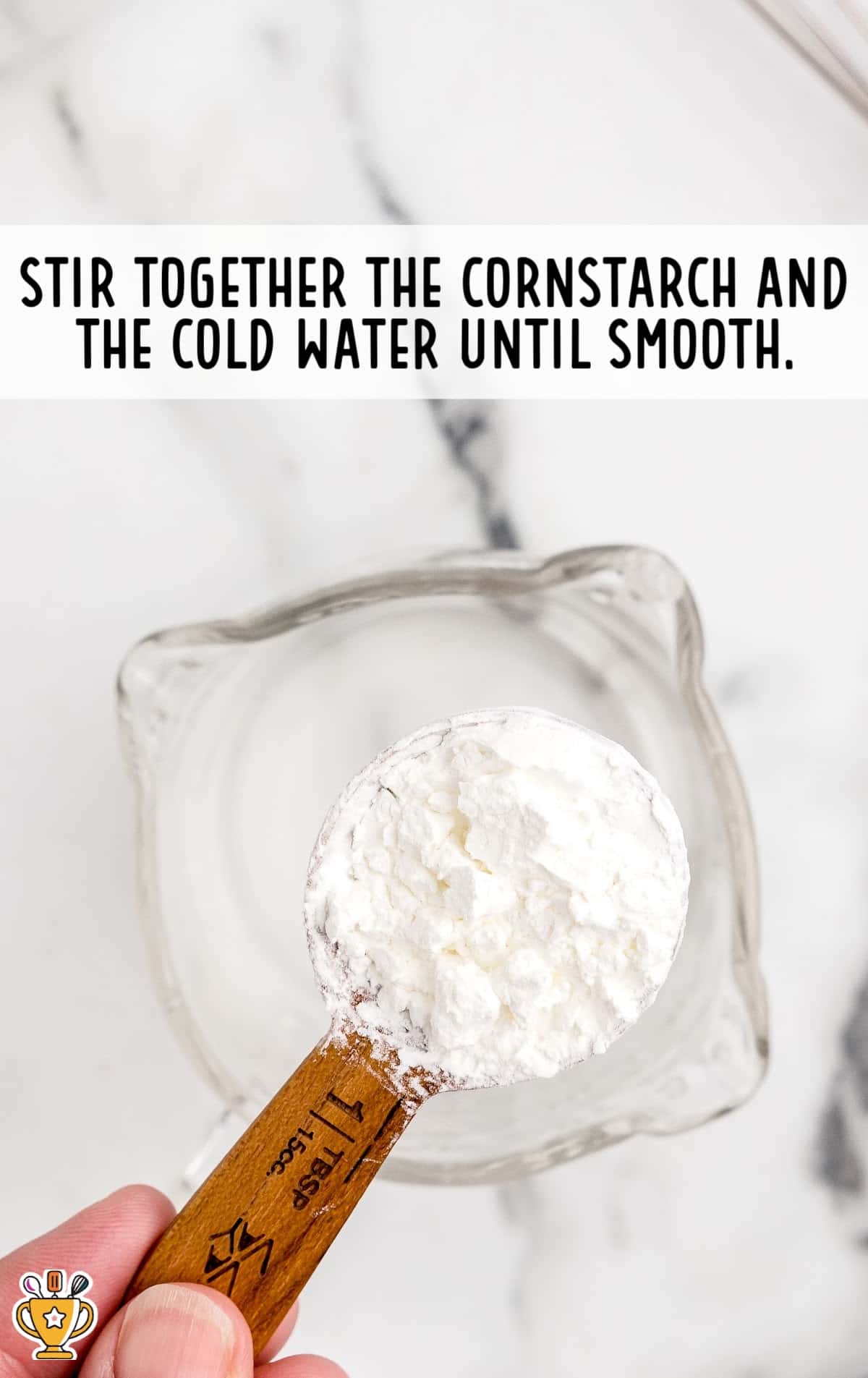 adding corn starch into a jar