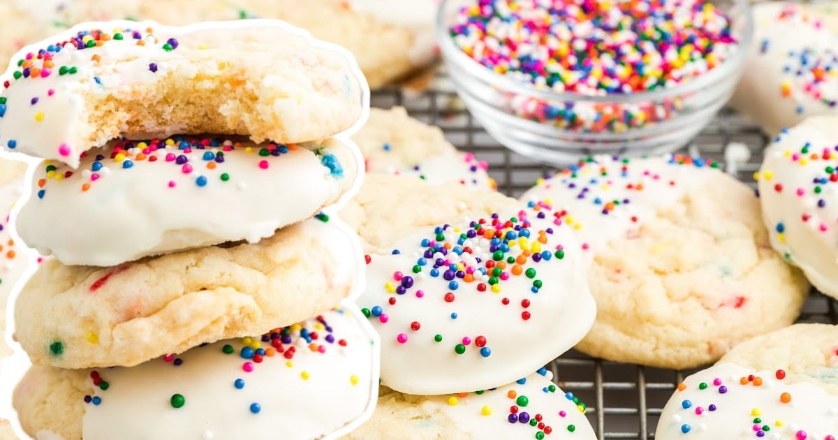 a stack of Cake Mix Cookies and others on a rack