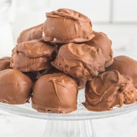 Chocolate Coconut Balls on a cake stand