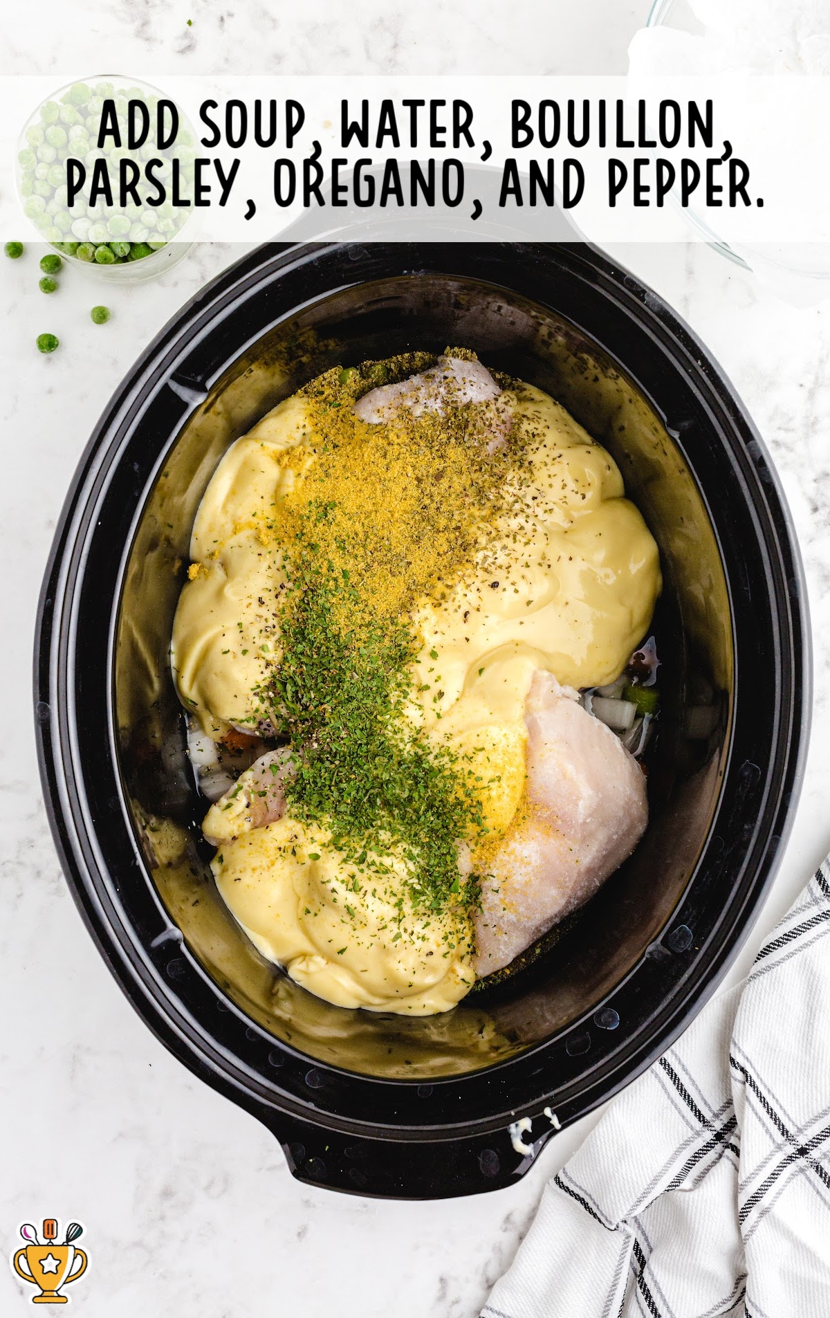 soup, water, bouillon, parsley, oregano and pepper added in the crockpot