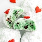 a Grinch Snowball Cookie cut into half