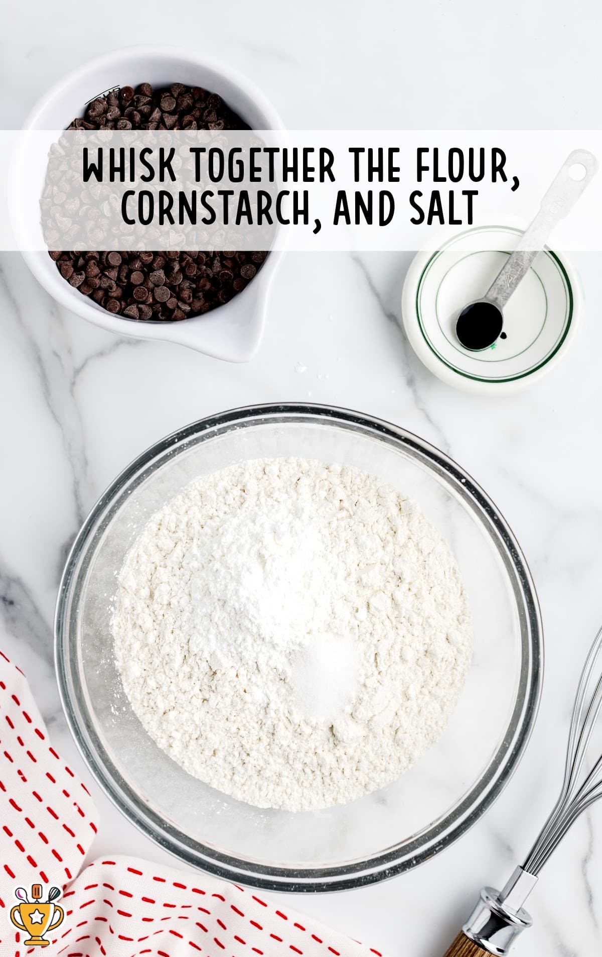 whisking together flour, cornstarch and salt in a bowl