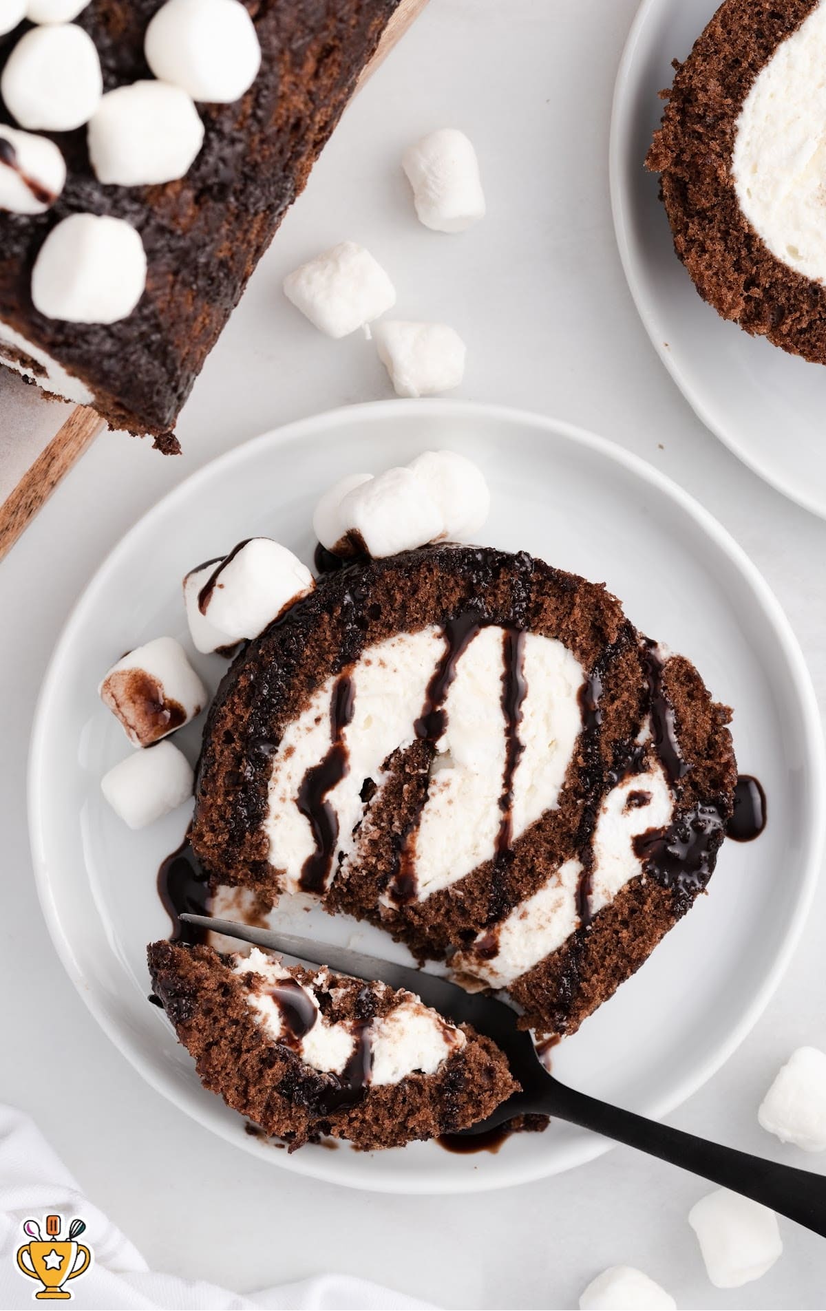 a piece of Hot Chocolate Roll Cake on a plate