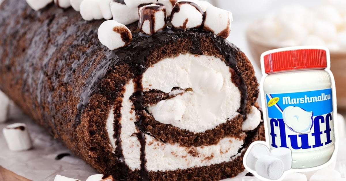 Hot Chocolate Roll Cake and a jar of marshmallow on the side