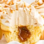 a bit open cupcake on a white plate