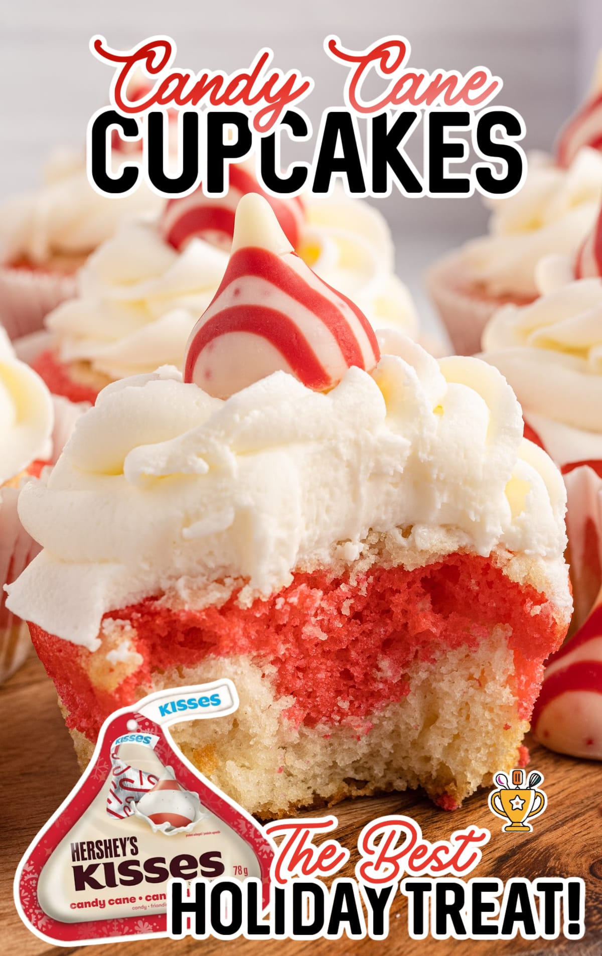 A Candy Cane Cupcake with a bite on it