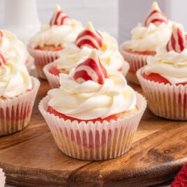 Candy Cane Cupcakes on a wooden board