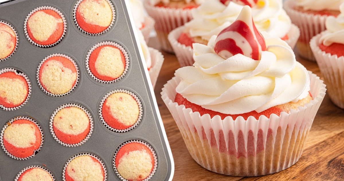 Candy Cane Cupcakes in a muffin pan and on a wooden surface