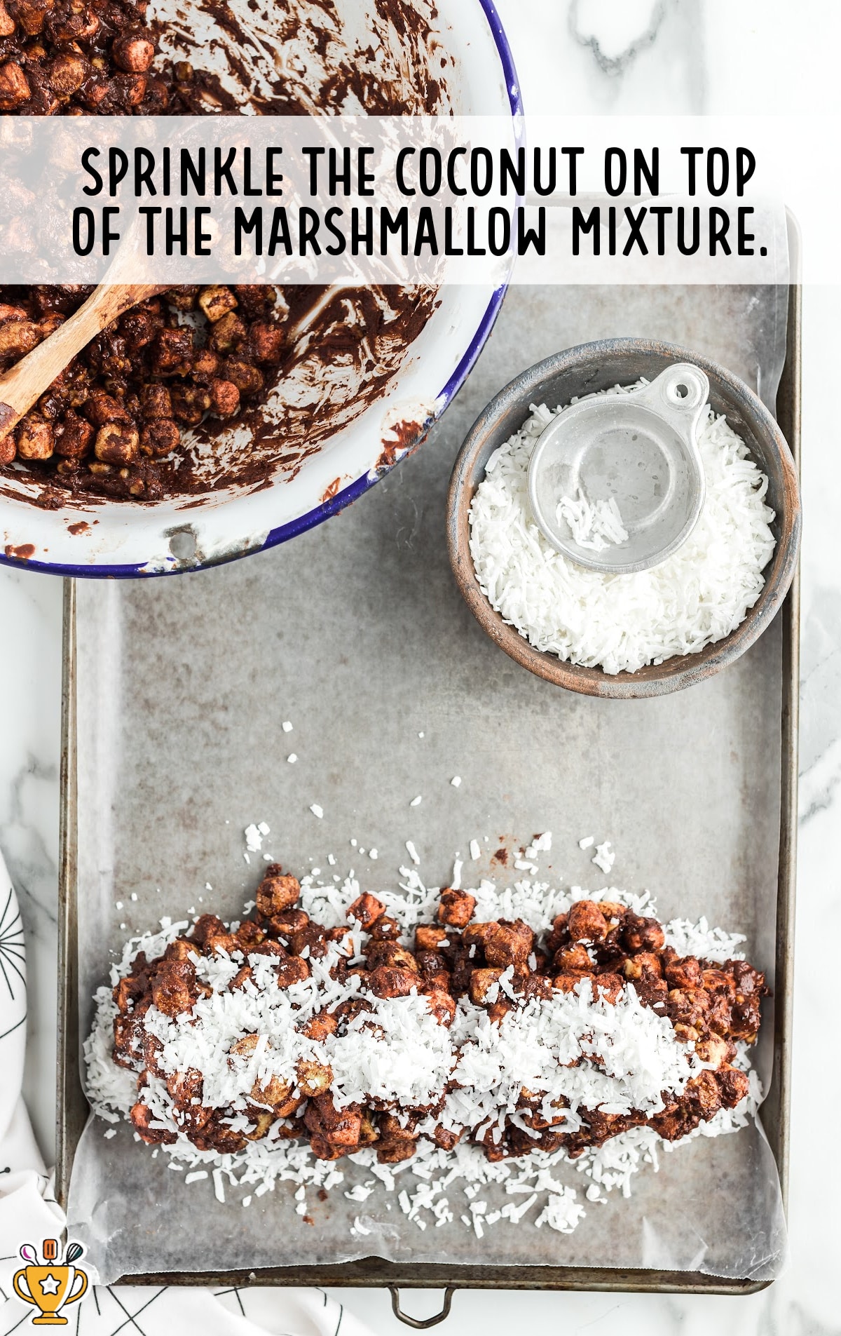 coconut sprinkles on top of the marshmallow mixture