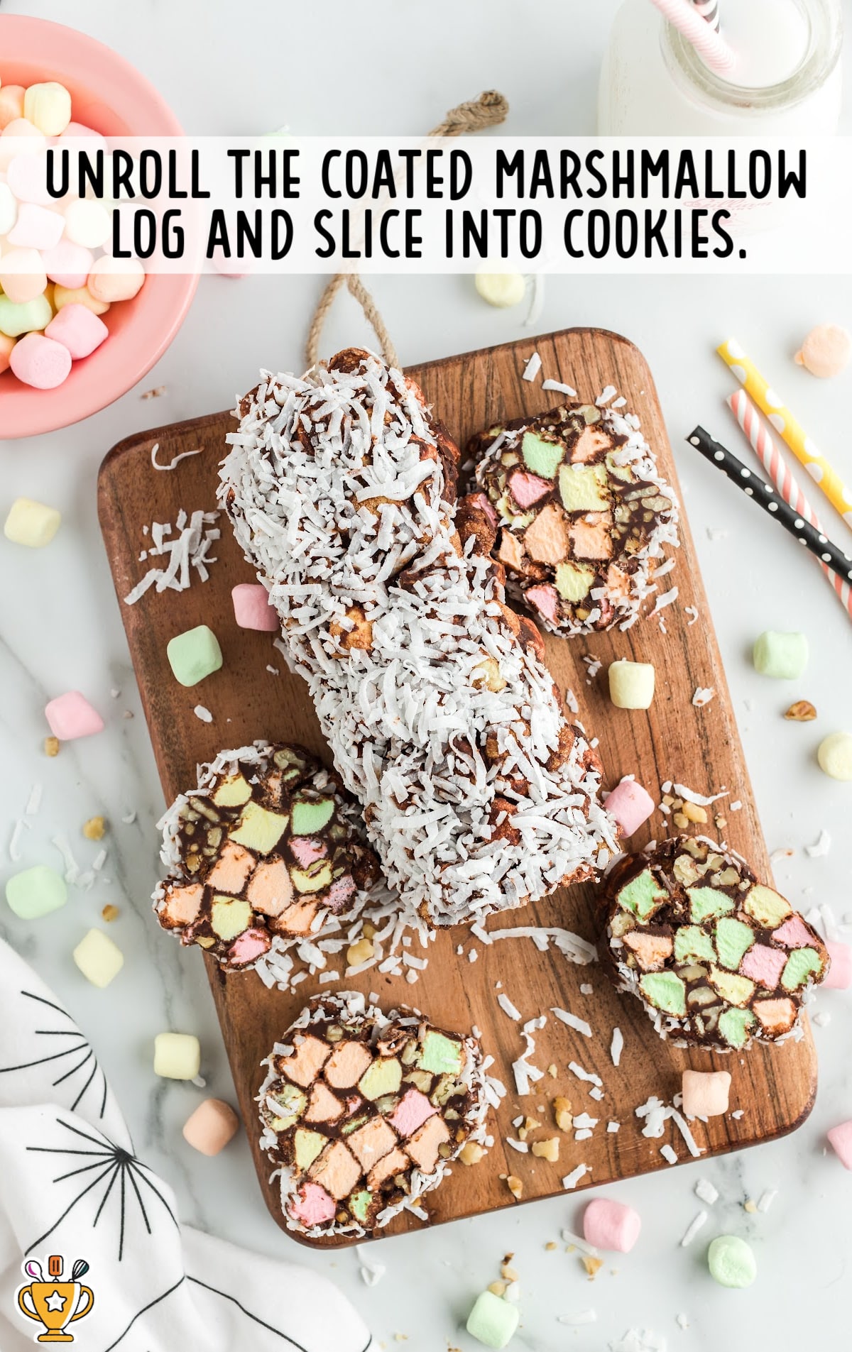 unrolling coated marshmallow log and slice into cookies