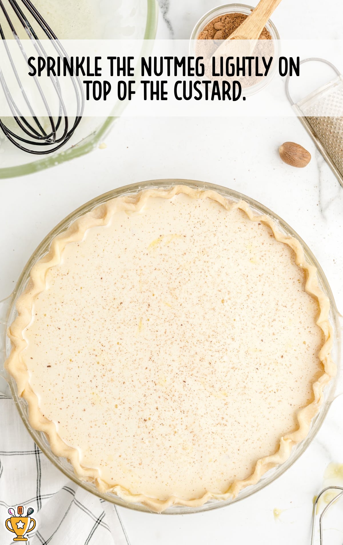 Nutmeg is lightly sprinkled over the pie.