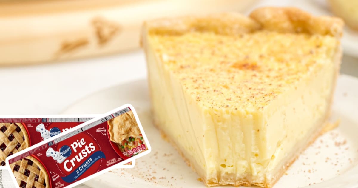 A piece of Custard Pie on a plate and 2 boxes of pie crusts.