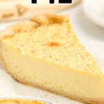 A slice of pie on a white dessert plate.