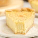 A piece of Custard Pie with a bite out of it.